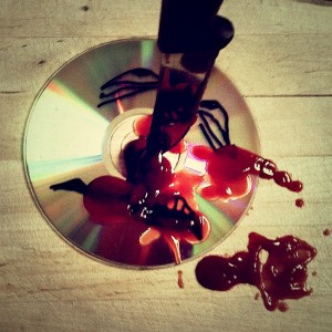 A 'stabbed' CD, oozing blood