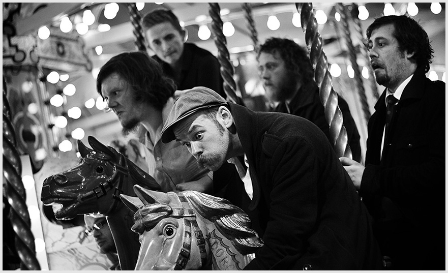 Louis Barabbas & The Bedlam Six on a fairground carousel